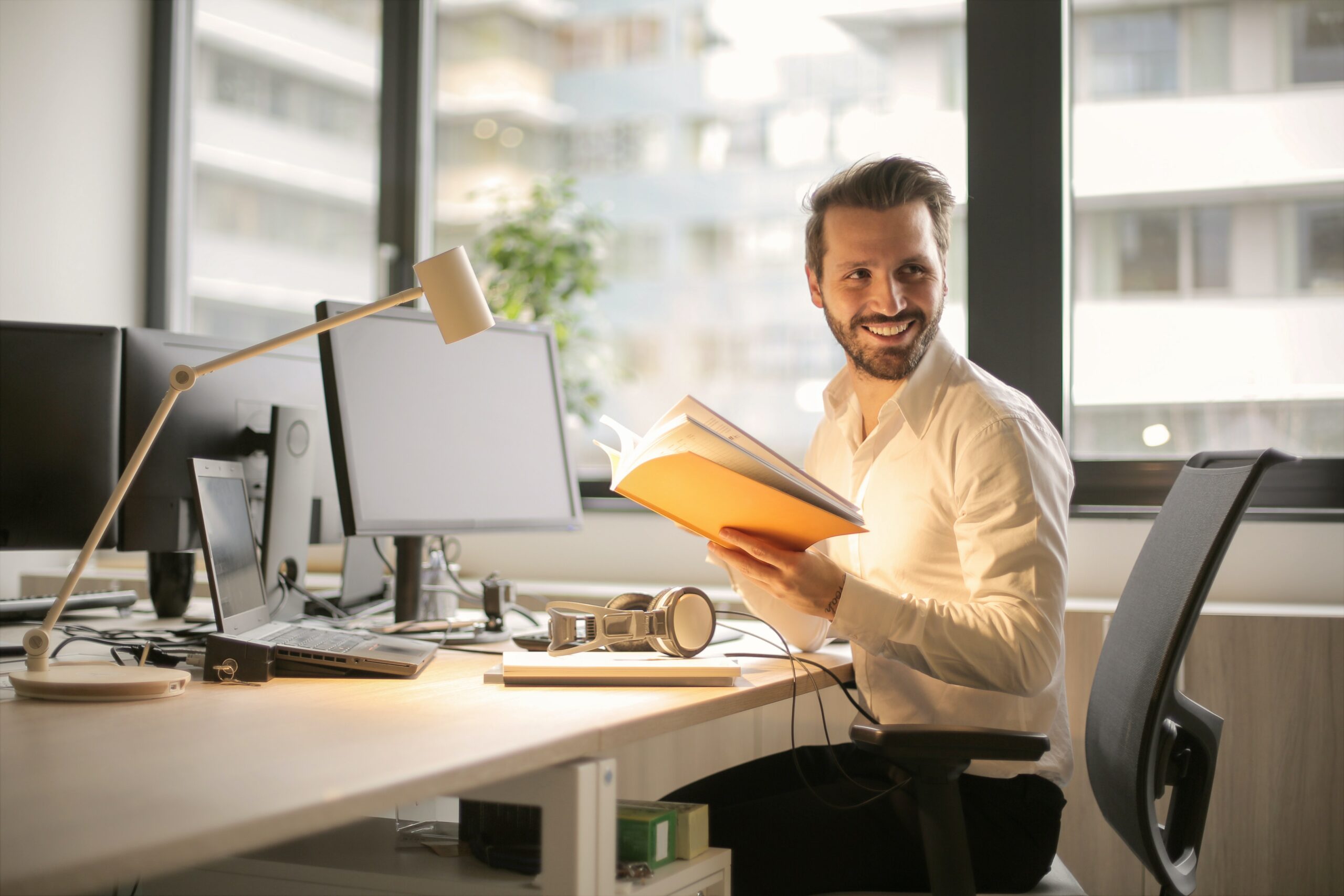 office man holding documents