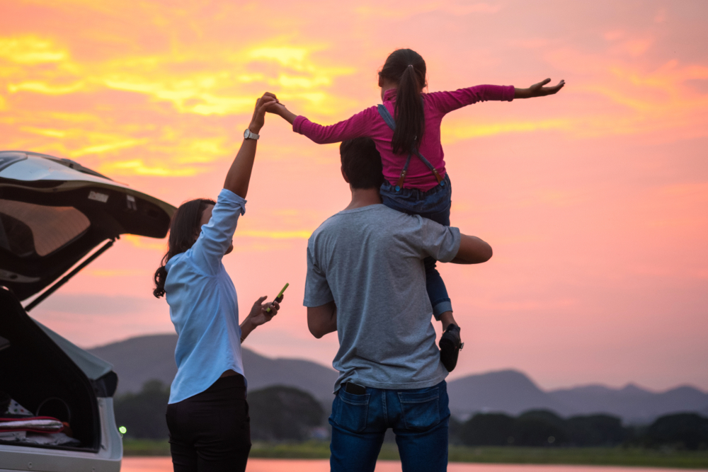 Asian,Family,Enjoying.,Happy,Little,Girl,With,Family,Sitting,In